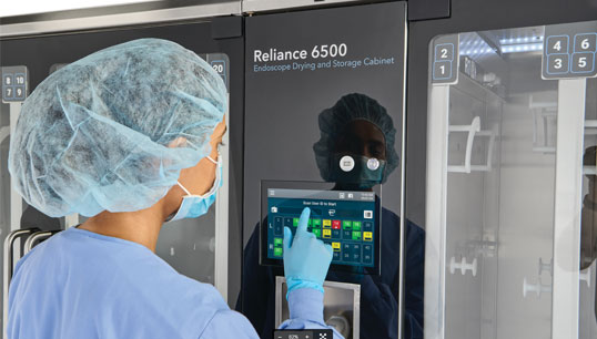 Technician using Endoscopy Cabinet