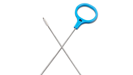 Dilator cleaning brush and handle