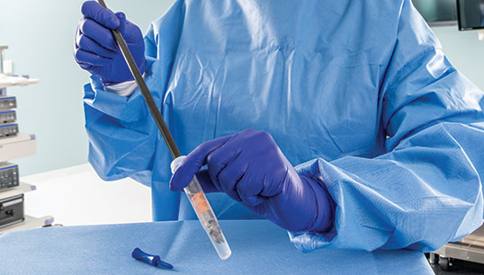 PRE-KLENZ Soak Shield being used to clean a surgical instrument