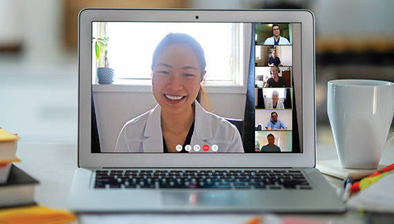 Provider leading a virtual training session on&nbsp;MySPM&nbsp;software via video call displayed on a laptop screen