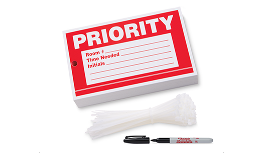 Write-on surgical instrument priority tag.