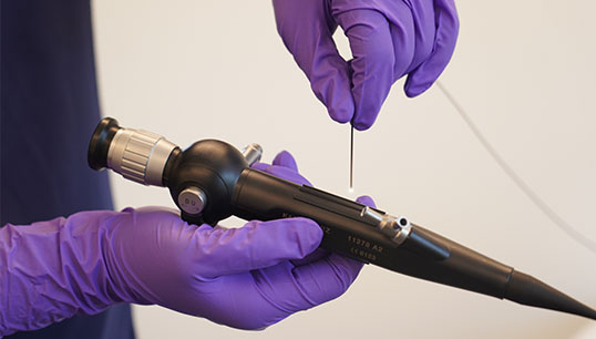 technician using VerifEYE video borescope