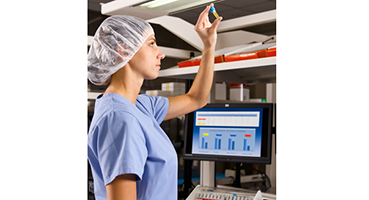 Technician Interpreting VERIFY Biological Indicator