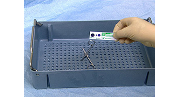 Passing VERIFY SixCess Indicator 270°F / 132°C 4 minute indicator strip (PCC006) used in an immediate use sterilization.