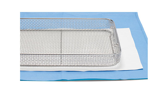 Soaker sheet under a sterilization tray