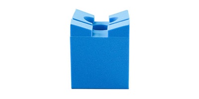 Disposable Richards Slotted Head Rest is a foam head positioner for spinal procedures.