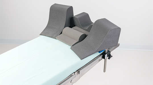 Patient positioning accessory for robotic surgery and steep Trendelenburg position
