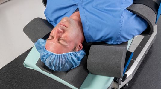 Trendelenburg patient restraint for surgical tables