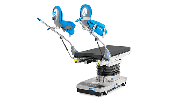 Surgical Table with leg stirrups above the table
