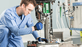 STERIS Technician working to conduct equipment repair.