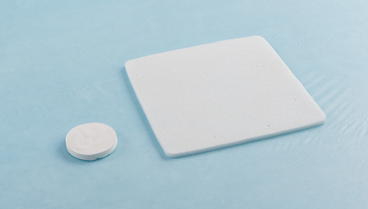 Compressed endoscope sponge expands once exposed to water.